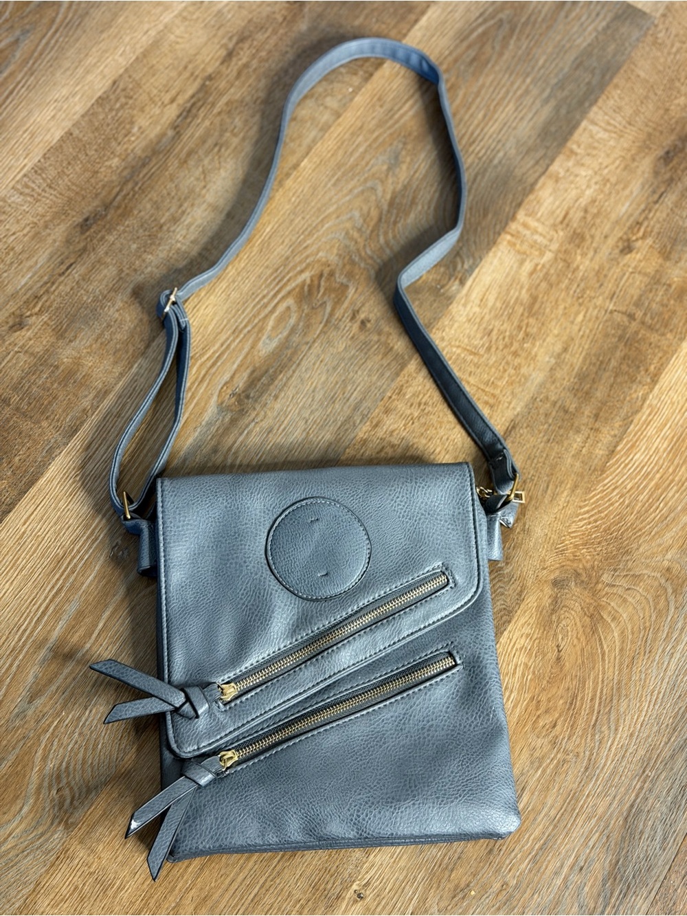 Minimal Grey Leather Crossbody Bag with Angled Zip Pockets